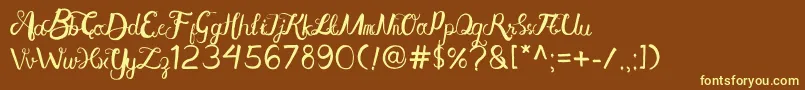 AisyKhadijah-fontti – keltaiset fontit ruskealla taustalla