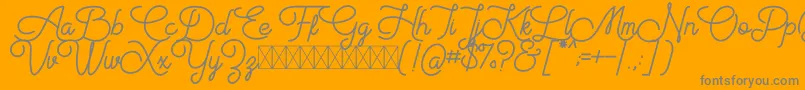 Aiushtya Free-Schriftart – Graue Schriften auf orangefarbenem Hintergrund