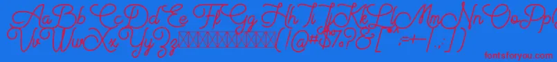 Aiushtya Free-Schriftart – Rote Schriften auf blauem Hintergrund