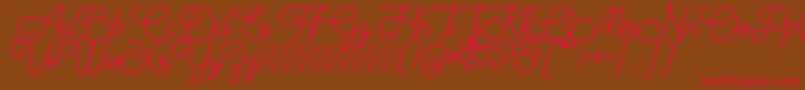 Aiushtya Free Font – Red Fonts on Brown Background