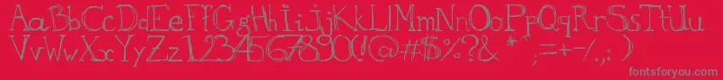 フォントaKa – 赤い背景に灰色の文字