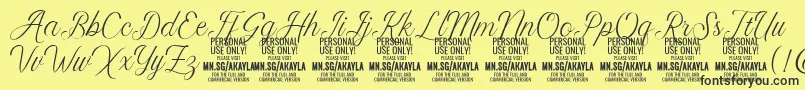 Fonte AkaylaScript PERSONAL – fontes pretas em um fundo amarelo