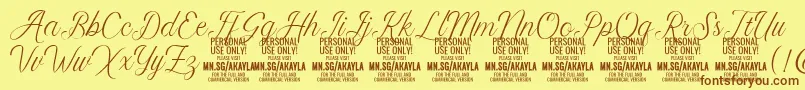 Fonte AkaylaScript PERSONAL – fontes marrons em um fundo amarelo