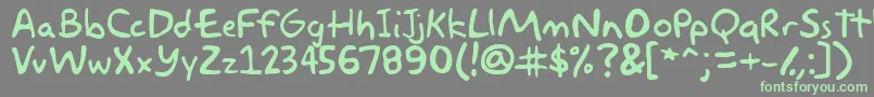 akbar Font – Green Fonts on Gray Background