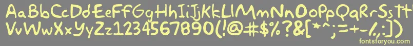 akbar Font – Yellow Fonts on Gray Background