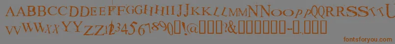 Шрифт AKOOM    – коричневые шрифты на сером фоне