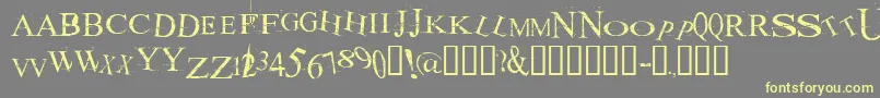 フォントAKOOM    – 黄色のフォント、灰色の背景