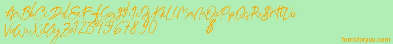 aksoro Demo Font – Orange Fonts on Green Background