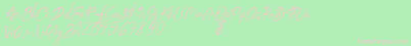 aksoro Demo Font – Pink Fonts on Green Background