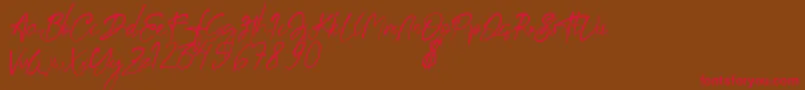 aksoro Demo Font – Red Fonts on Brown Background