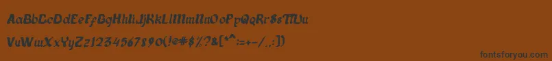 aladina Font – Black Fonts on Brown Background