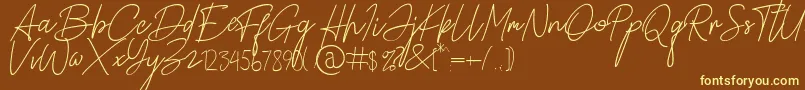 Alamanda Santika Signature Font – Yellow Fonts on Brown Background