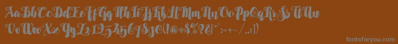 Alamark Lite Free Font – Gray Fonts on Brown Background