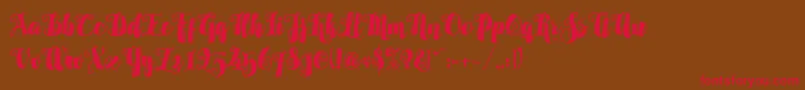 Alamark Lite Free Font – Red Fonts on Brown Background
