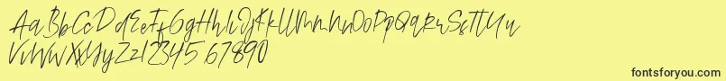 Alamode Font – Black Fonts on Yellow Background