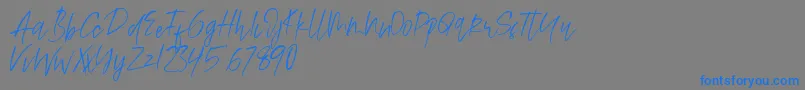 Alamode Font – Blue Fonts on Gray Background