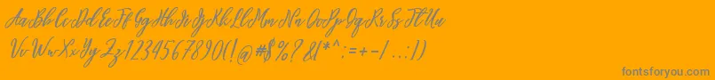 フォントalana you – オレンジの背景に灰色の文字