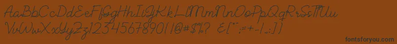ALBELIA-Schriftart – Schwarze Schriften auf braunem Hintergrund