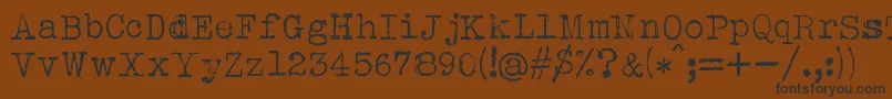 fuente Albertsthal Typewriter – Fuentes Negras Sobre Fondo Marrón