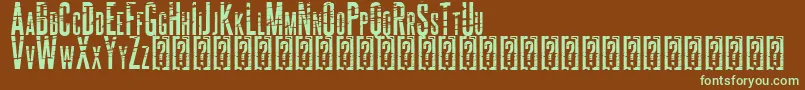 フォントALCATRAZ – 緑色の文字が茶色の背景にあります。