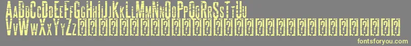 フォントALCATRAZ – 黄色のフォント、灰色の背景