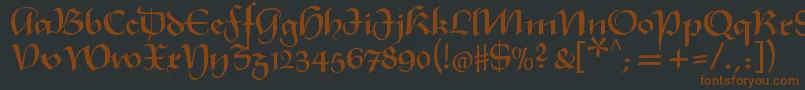 Xmasterpieceregular-fontti – ruskeat fontit mustalla taustalla