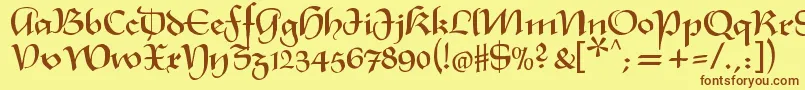 フォントXmasterpieceregular – 茶色の文字が黄色の背景にあります。