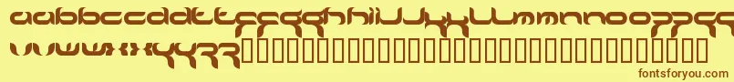 フォントCrafty ffy – 茶色の文字が黄色の背景にあります。