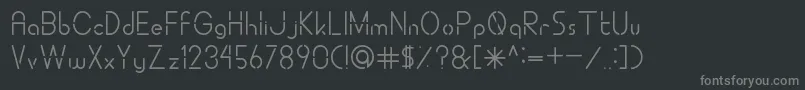 フォントALDORACutting – 黒い背景に灰色の文字