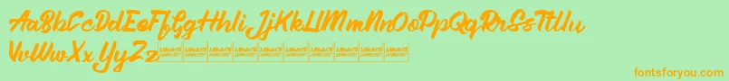 Aleenademo-Schriftart – Orangefarbene Schriften auf grünem Hintergrund