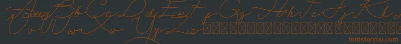 Fonte Alegant Script Free – fontes marrons em um fundo preto