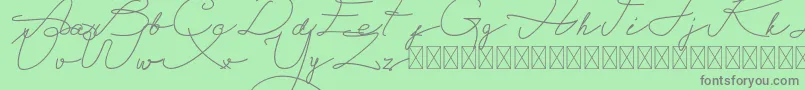 Alegant Script Free Font – Gray Fonts on Green Background
