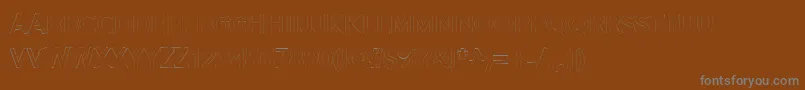 Alesand Extra Outline-Schriftart – Graue Schriften auf braunem Hintergrund