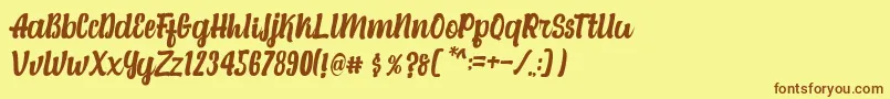 Alexandria Script Font – Brown Fonts on Yellow Background