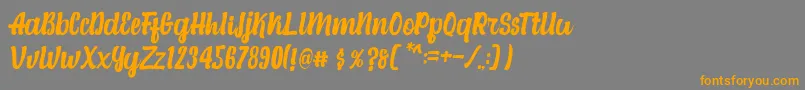 Alexandria Script-Schriftart – Orangefarbene Schriften auf grauem Hintergrund