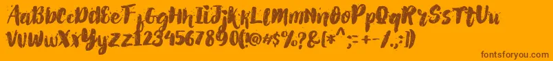 Fonte AlexDirte Brush Font – fontes marrons em um fundo laranja