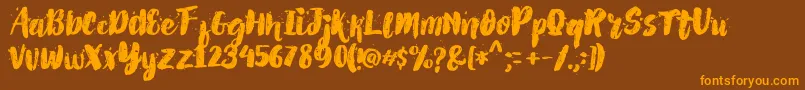 Czcionka AlexDirte Brush Font – pomarańczowe czcionki na brązowym tle