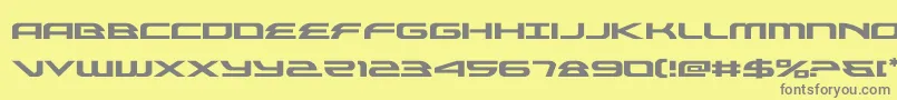 フォントalexisv3expand – 黄色の背景に灰色の文字