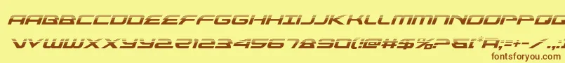 フォントalexisv3halfital – 茶色の文字が黄色の背景にあります。