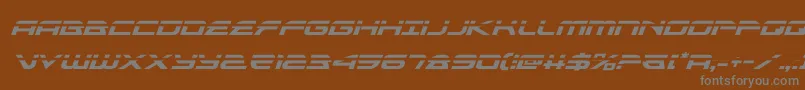 フォントalexisv3laserital – 茶色の背景に灰色の文字