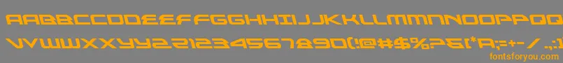 フォントalexisv3left – オレンジの文字は灰色の背景にあります。