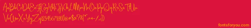 Aleyna Font – Orange Fonts on Red Background
