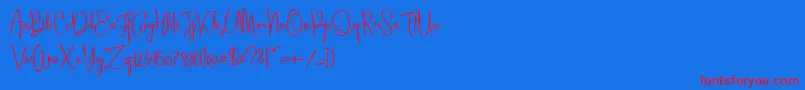Aleyna Font – Red Fonts on Blue Background