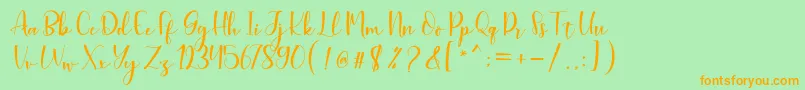 Aleysia Script Font – Orange Fonts on Green Background