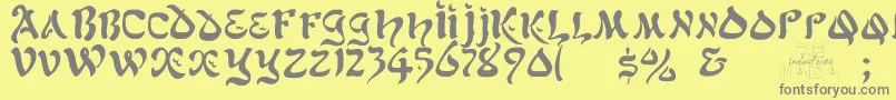 フォントAlfredDrake – 黄色の背景に灰色の文字