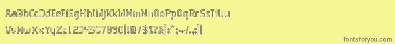 Algorithma-fontti – harmaat kirjasimet keltaisella taustalla