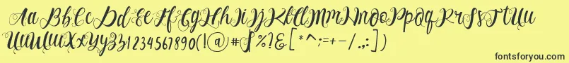 フォントAlhenya Script – 黒い文字の黄色い背景