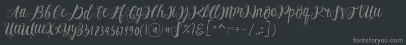 フォントAlhenya Script – 黒い背景に灰色の文字