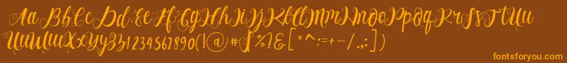 Alhenya Script-fontti – oranssit fontit ruskealla taustalla