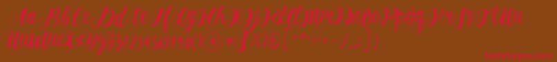 Alhenya Script-Schriftart – Rote Schriften auf braunem Hintergrund